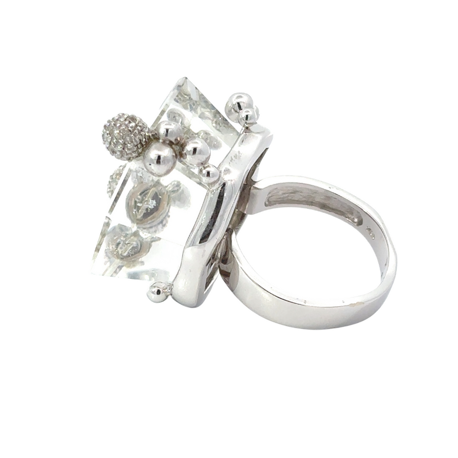 Women’s size 7 white gold ring with minimalist diamond design