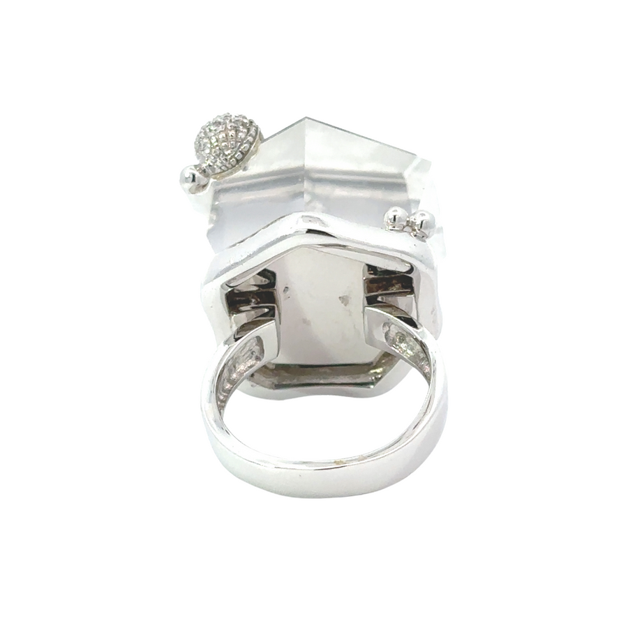 18k white gold ring with single quartz diamond on velvet display