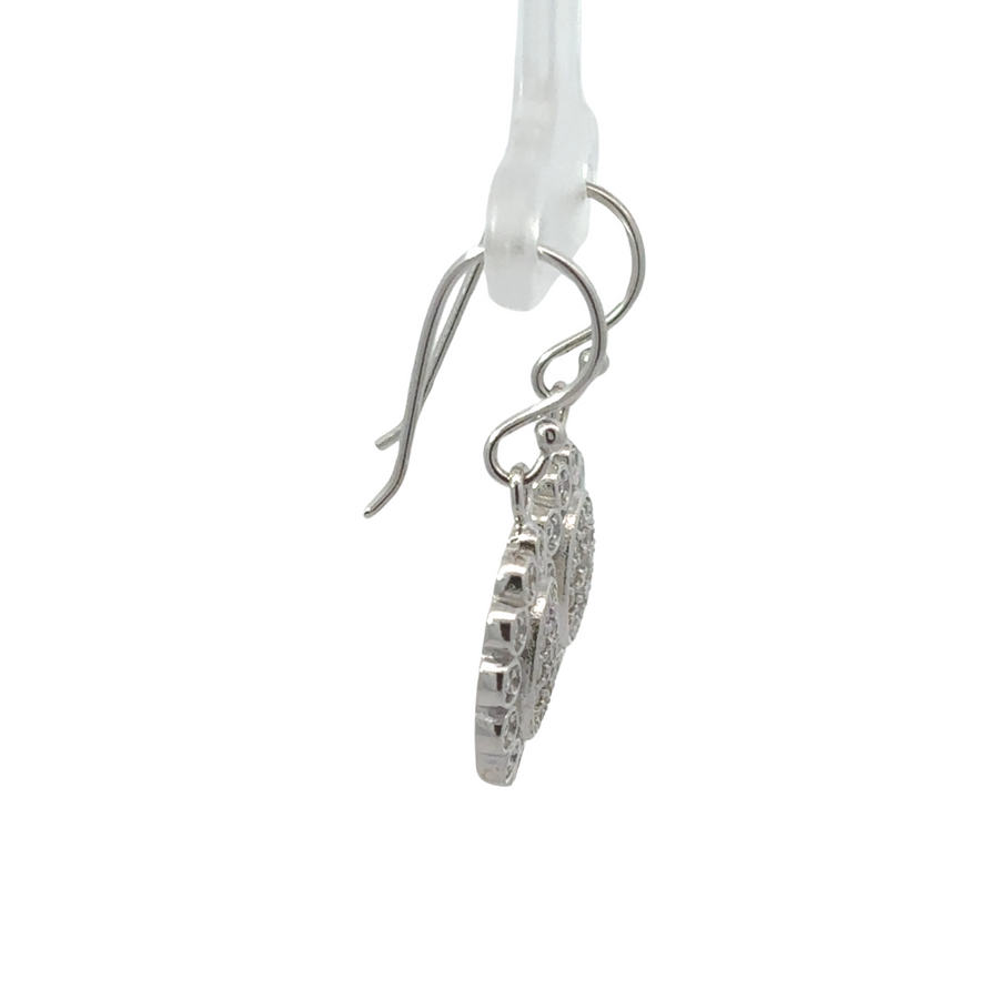 Elegant silver earrings with floral design in white gold