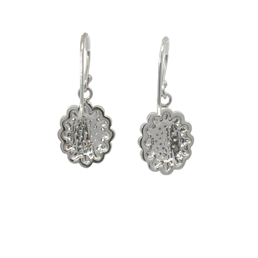Delicate flower earrings crafted from silver and white gold