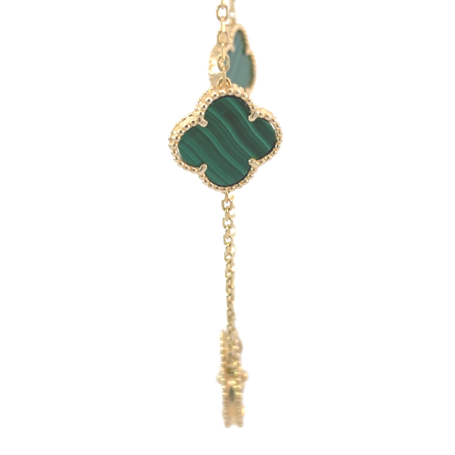 Adjustable 17-18 inch gold necklace with vibrant green stones