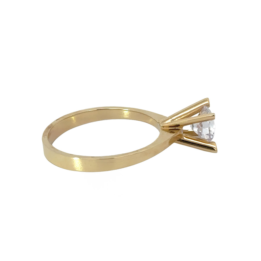 Minimalist solitaire ring crafted in 14k gold for women