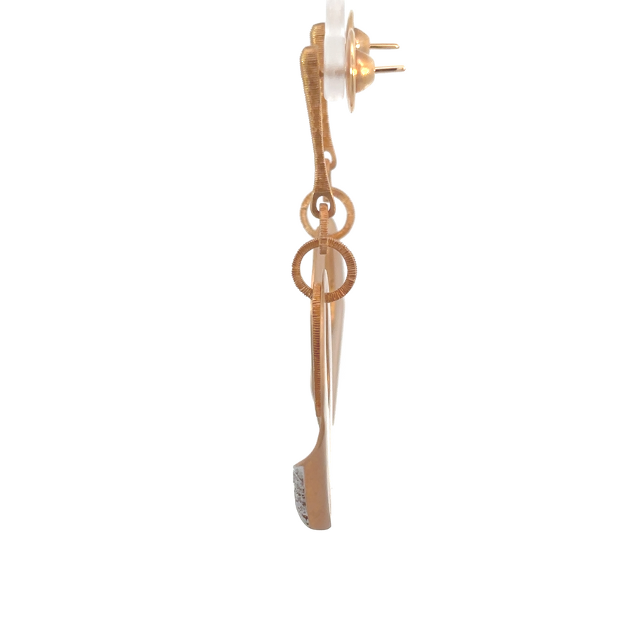 Elegant 18k gold earrings featuring brilliant diamond accents