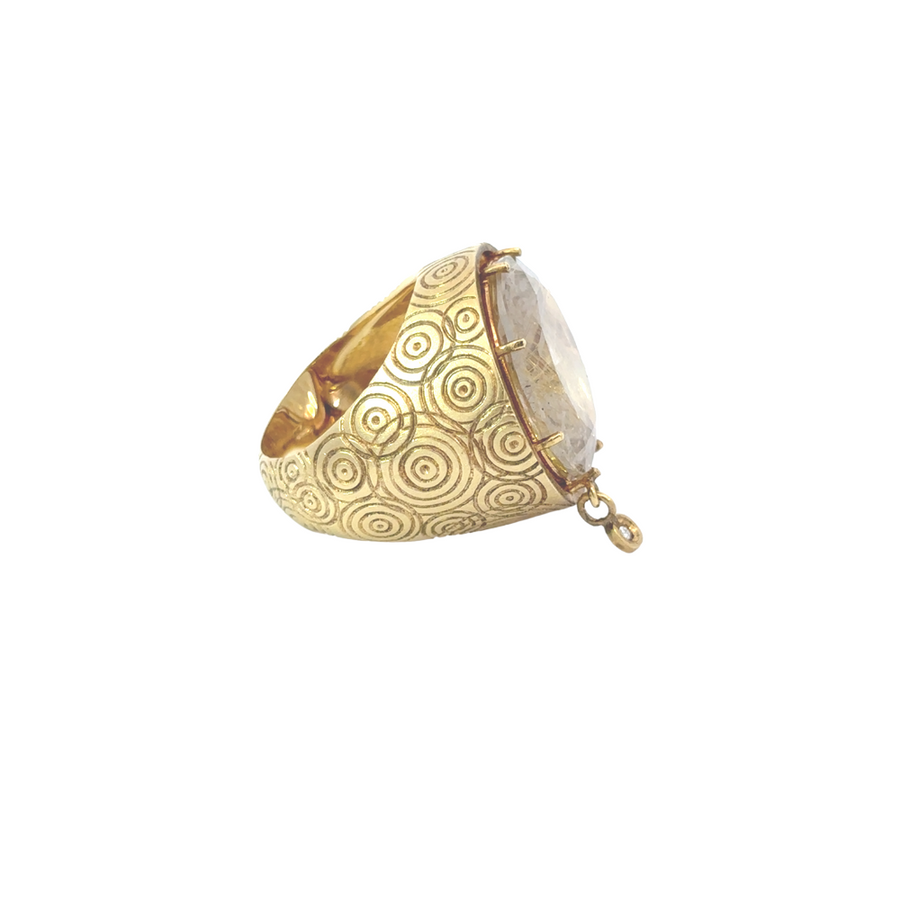 Close-up of YG RTHLTD ring featuring quartz gem