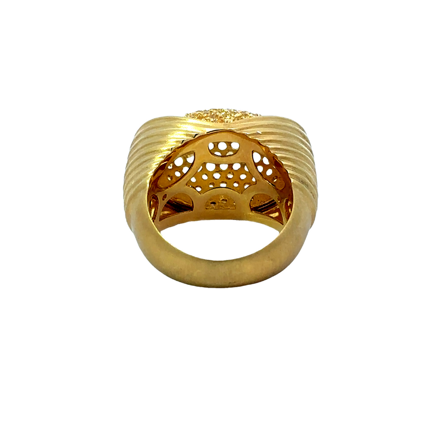 Elegant diamond gold ring displayed in jewelry box