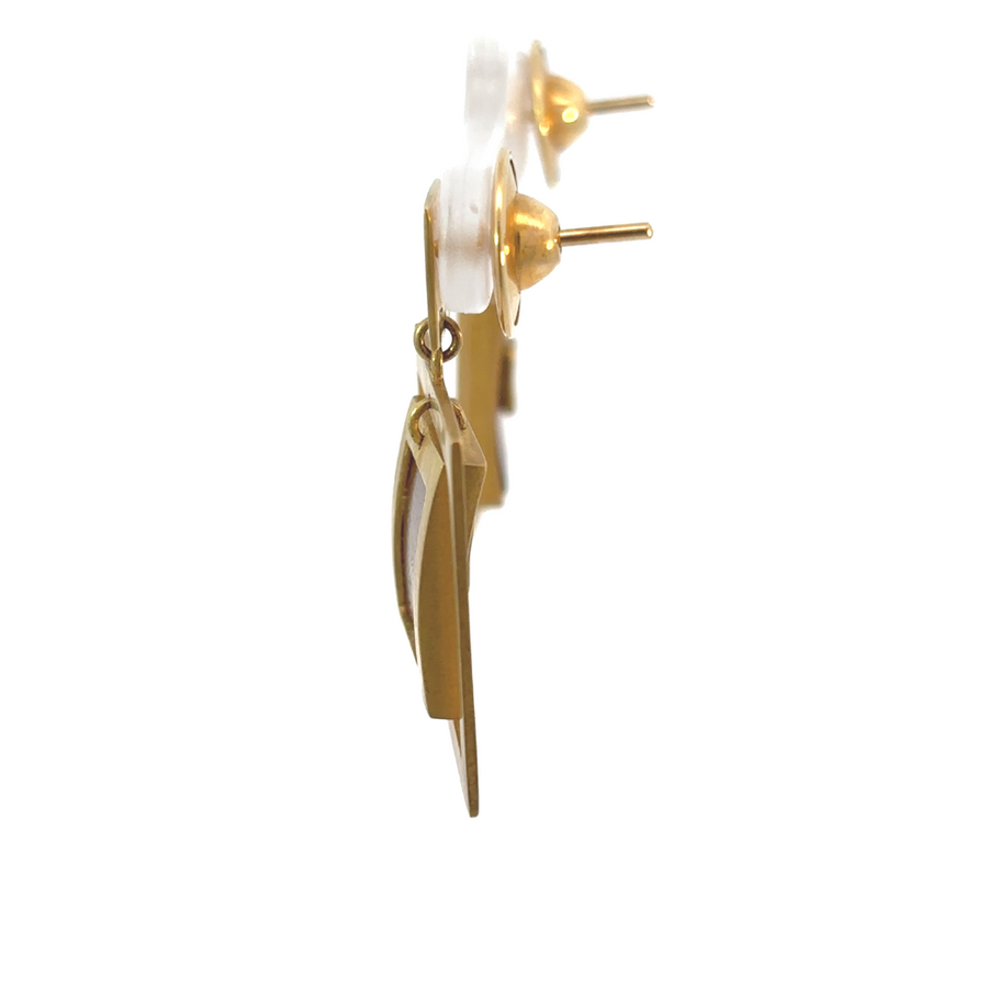 Women’s modern wood and gold square jewelry close-up