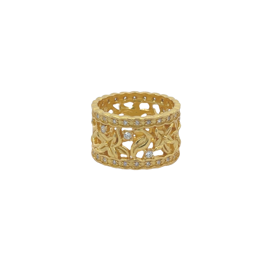 Yellow gold flower and leaf ring size 7.5 on white background