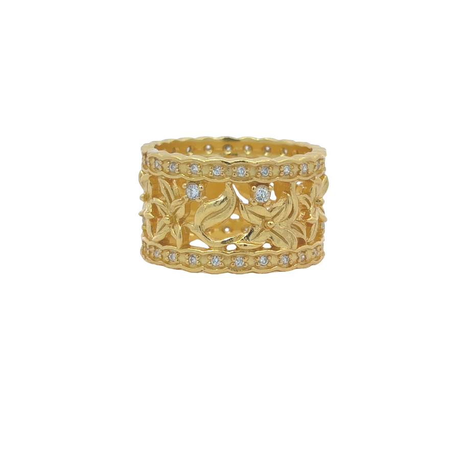 Yellow gold flower and leaf ring size 7 on white background